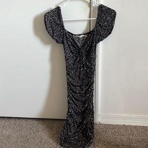 Skin tight black mini dress size XXS (would fit best for sizes 0-4 in dresses)